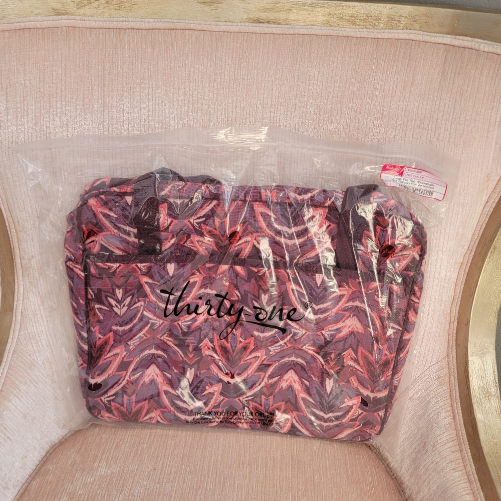 NIP floral ikat away for the weekender by thirty-one